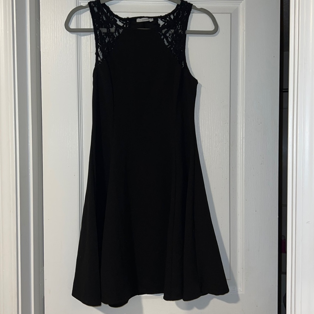 black dress goes to the knees